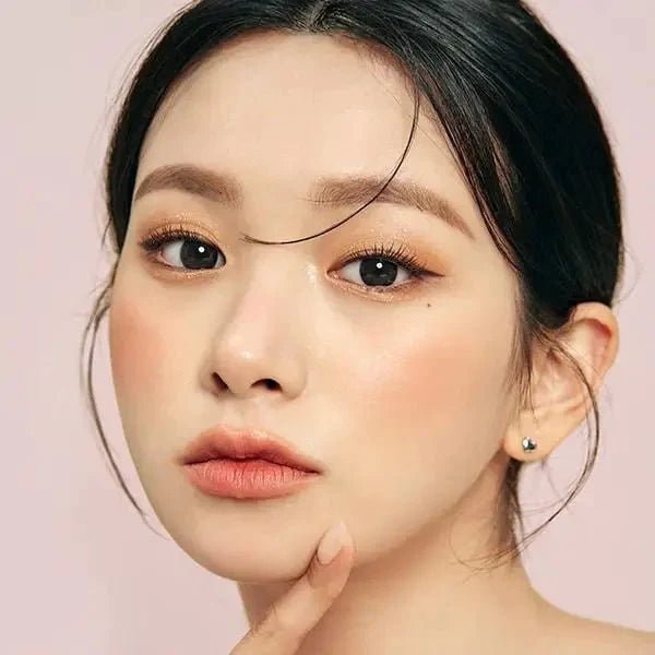 LensTown Konimo2 Black — model portrait showing the contact lens look