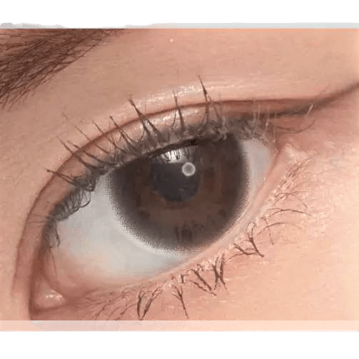 Olens Classi Water Black — single-eye close-up showing the contact lens appearance