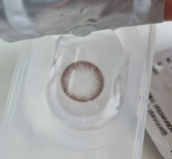 Olens Falling Choco — contact lens displayed in a blister pack