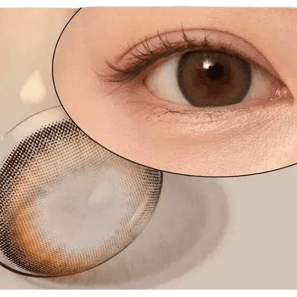 Olens Nils Brown — contact lens held on a fingertip