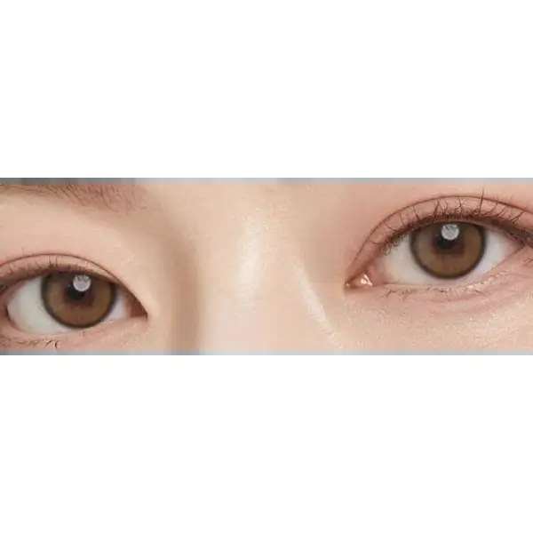 Olens Real Ring Brown — single-eye close-up showing the contact lens appearance