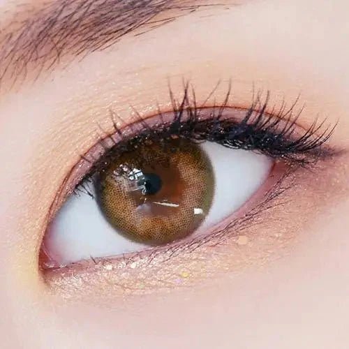 LensTown 247 With Me Olive (10p) — single-eye close-up showing the contact lens appearance