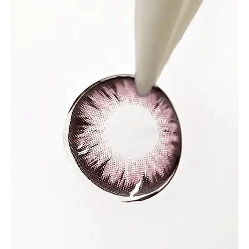 LensTown Back to Basic Macaron Pink — contact lens held with tweezers