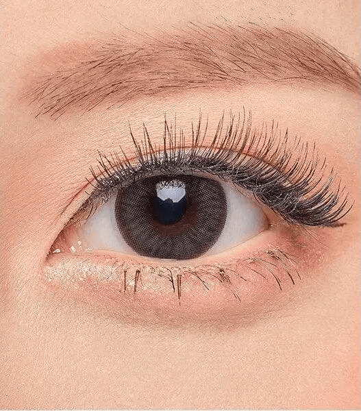 Olens Bigsome Gray — single-eye close-up showing the contact lens appearance