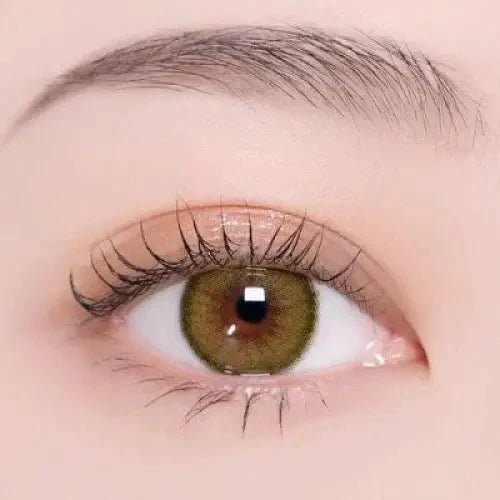 i-DOL Canna Roze Olive Green — single-eye close-up showing the contact lens appearance