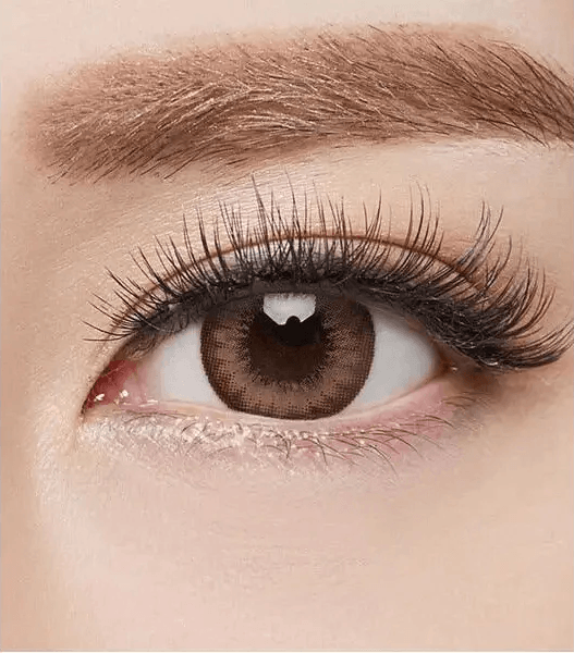 Olens Chandelier Brown — single-eye close-up showing the contact lens appearance