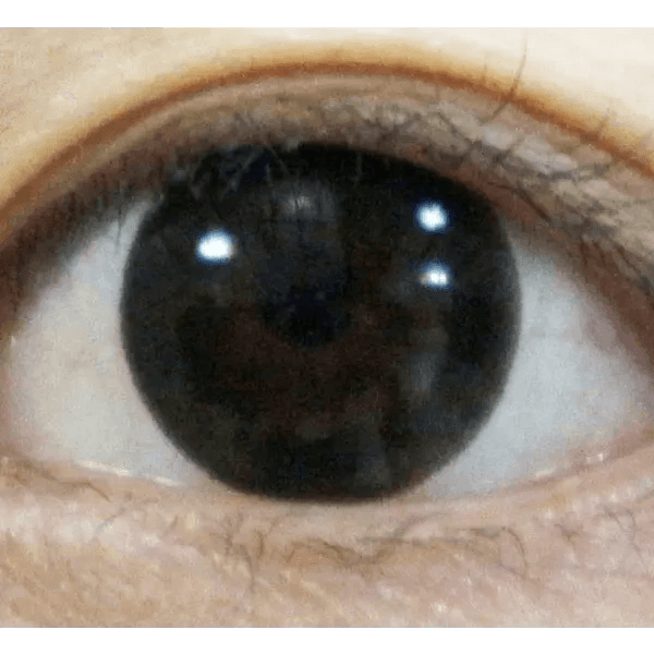 Olens Indie Black — single-eye close-up showing the contact lens appearance