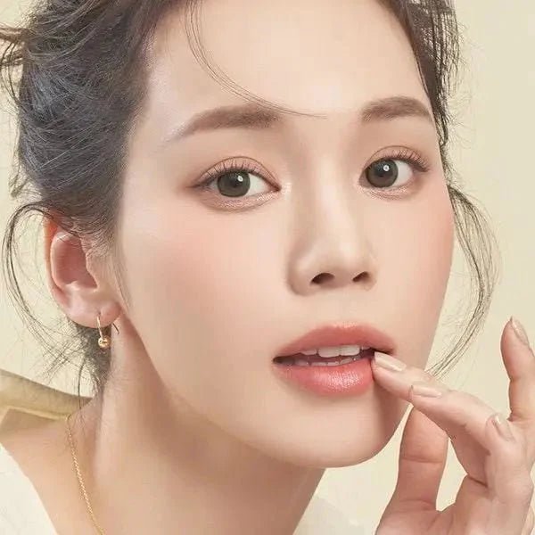 LensTown It's Natural Forest Green — model portrait showing the contact lens look