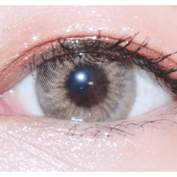 LensTown Kakao Friends Ryan Brown — single-eye close-up showing the contact lens appearance