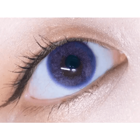 LensTown Tint Bling Unicorn Violet — single-eye close-up showing the contact lens appearance