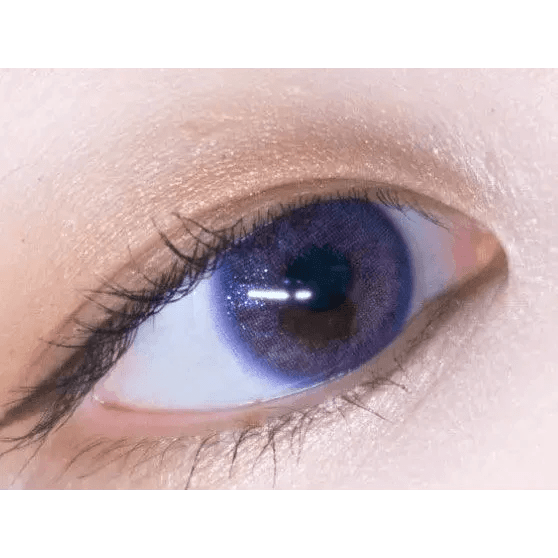 LensTown Tint Bling Unicorn Violet — single-eye close-up showing the contact lens appearance