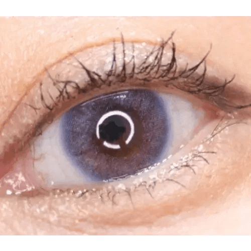 LensTown Tint Bling Unicorn Violet — single-eye close-up showing the contact lens appearance