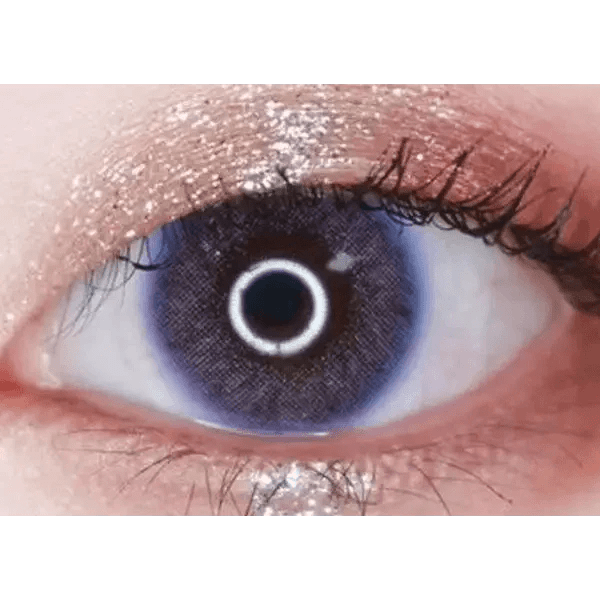 LensTown Tint Bling Unicorn Violet — single-eye close-up showing the contact lens appearance