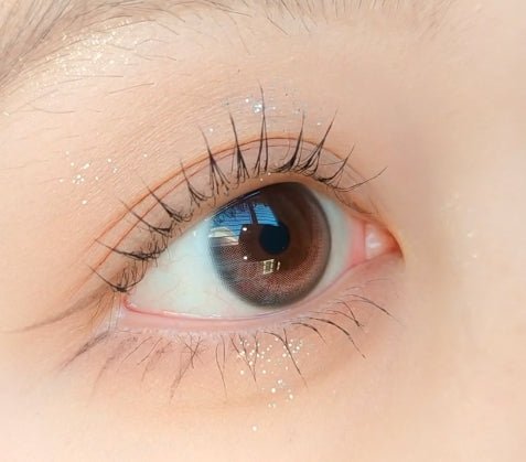 LensVery Rose Moon Rosy Pink colored contacts - on-eye close-up showing the color and design