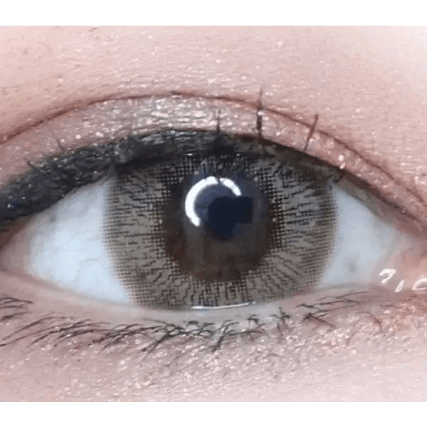 LensTown Lighly Lily Brown (20p) — single-eye close-up showing the contact lens appearance