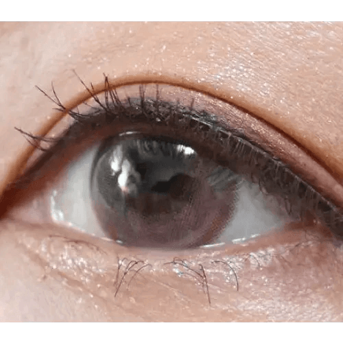 LensTown Lighly Mellow Pink (20p) — single-eye close-up showing the contact lens appearance
