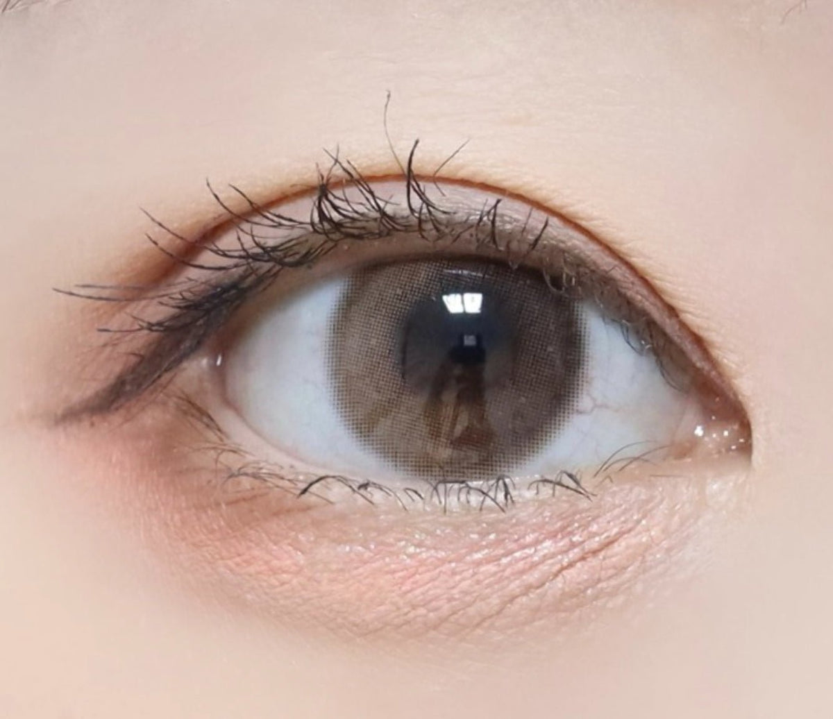 LensTown Odd I's M plain odd Apricot colored contact lens, 13.0mm graphic diameter, Monthly wear