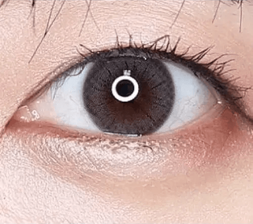 Olens ShineB Gray — single-eye close-up showing the contact lens appearance