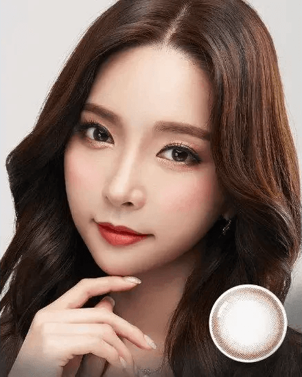 Olens Someday Brown — model portrait showing the contact lens look