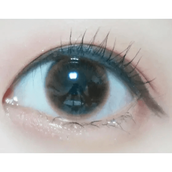 Olens Spring Rain Brown — single-eye close-up showing the contact lens appearance