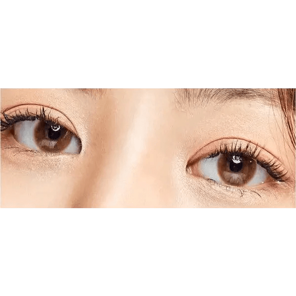 Olens Spring Rain Brown — single-eye close-up showing the contact lens appearance