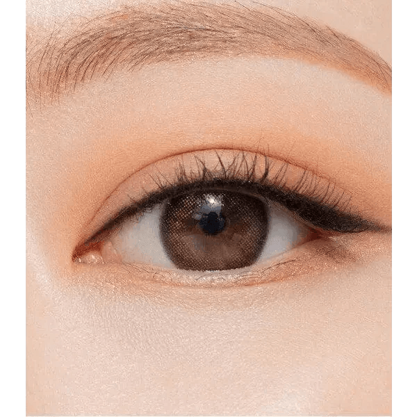 Olens Pearl Day Gold Black — single-eye close-up showing the contact lens appearance