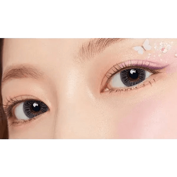 Olens Plie Violet — both eyes wearing the contact lenses