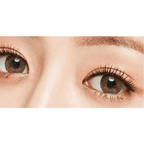 Olens Rich Brown — single-eye close-up showing the contact lens appearance
