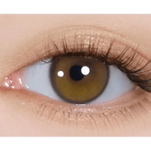 i-DOL Yurial Royal Brown — single-eye close-up showing the contact lens appearance