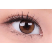 i-DOL Yurial Royal Brown — single-eye close-up showing the contact lens appearance
