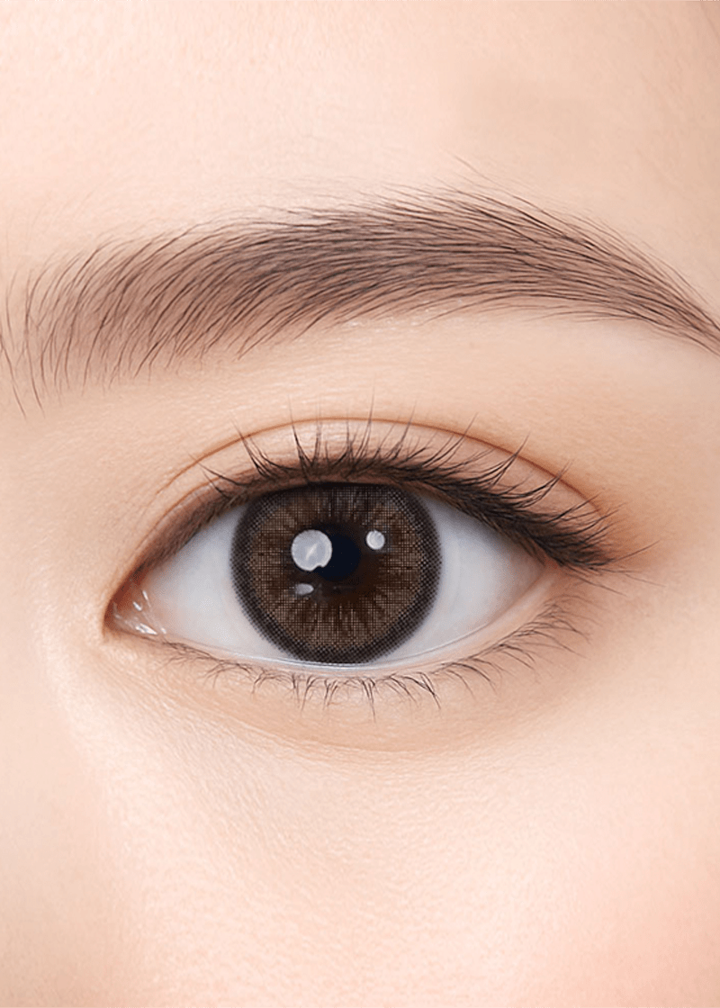 Clalen O2O2 Ash Gray Daily 12.9mm — close-up view of the contact lens on an eye
