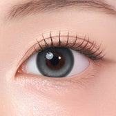 LensTown Keeping Lens Flu Gray - on-eye close-up showing the lens color and design