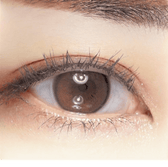 i-DOL Yurial Water Brown — single-eye close-up showing the contact lens appearance