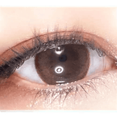 LensTown It's Natural Cappuccino — single-eye close-up showing the contact lens appearance
