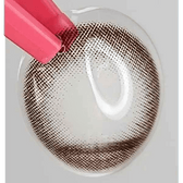 LensTown Konimo2 Choco — contact lens held with tweezers
