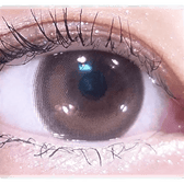 Olens Cherry Moon Brown — single-eye close-up showing the contact lens appearance