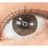 Olens Coming Choco — single-eye close-up showing the contact lens appearance