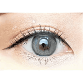 Olens Eyelighter Glowy Ash Gray — single-eye close-up showing the contact lens appearance