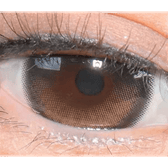 Olens Eyelighter Glowy Black — single-eye close-up showing the contact lens appearance