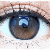 Olens Eyelighter Glowy Black — single-eye close-up showing the contact lens appearance