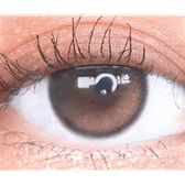 Olens Eyelighter Glowy Black — single-eye close-up showing the contact lens appearance