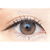 Olens Eyelighter Glowy Brown — single-eye close-up showing the contact lens appearance