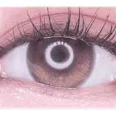 Olens Eyelighter Glowy Brown — single-eye close-up showing the contact lens appearance