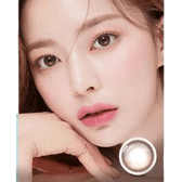 Olens Eyelighter Glowy Brown — model portrait showing the contact lens look
