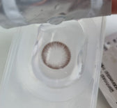 Olens Falling Choco — contact lens displayed in a blister pack