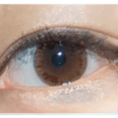 Olens Monet Brown — single-eye close-up showing the contact lens appearance