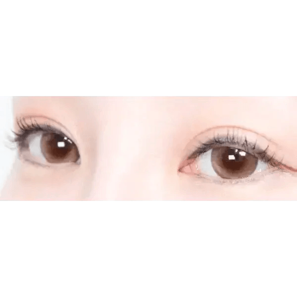 Olens Nils Brown — both eyes wearing the contact lenses