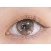 LensTown 247 Fit Brown (10p) — single-eye close-up showing the contact lens appearance