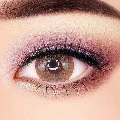 LensTown 247 Fit Brown (10p) — single-eye close-up showing the contact lens appearance