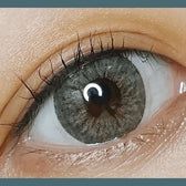LensTown 247 Fit Green (10p) — single-eye close-up showing the contact lens appearance